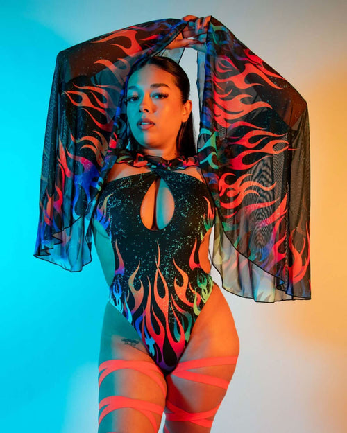 Model showcasing Blaze Mesh Bell Sleeves with vibrant flame print, perfect for rave outfits and festival wear.