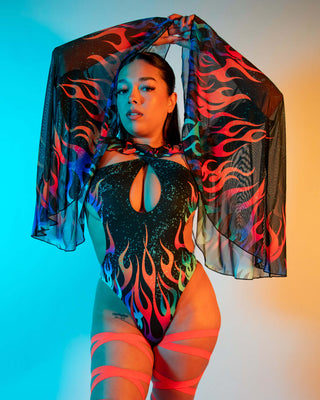 Model showcasing Blaze Mesh Bell Sleeves with vibrant flame print, perfect for rave outfits and festival wear.