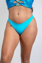 Cabo Blue Brazilian Bikini Bottoms, front view with a low-rise cut, ideal for expressing yourself at events.