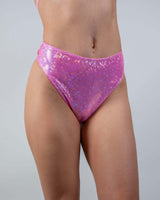 Bubble Gum Holo High Waisted Thong showcased on model, vibrant pink for rave outfits and stylish summer wear.