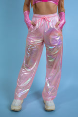 Bubble Gum Lucy Pants in iridescent pink, front view, high-waisted with relaxed fit, perfect for rave fashion and festival style.