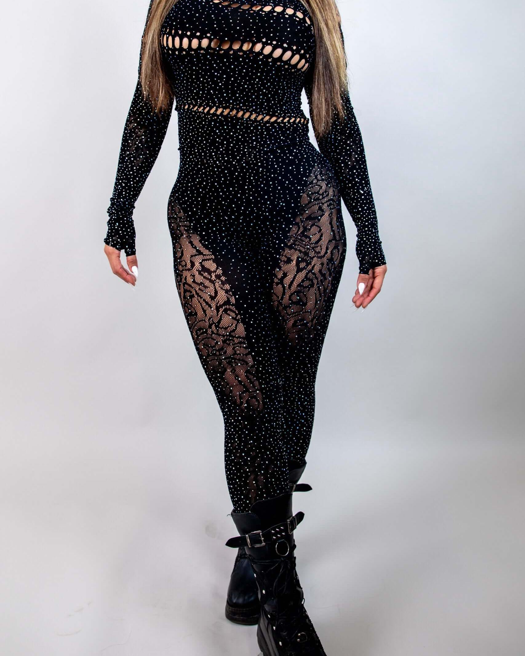 Black rhinestone off the shoulder jumpsuit with cutouts, perfect for rave outfits. Stylish and comfortable for any body type.