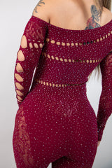 Burgundy rhinestone off the shoulder jumpsuit with cut-out details, perfect for bold rave outfits.