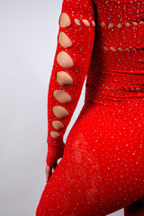 Close-up of the Camilla Rhinestone Off the Shoulder Jumpsuit in red, featuring cutouts and sparkling rhinestones, perfect for rave outfits.