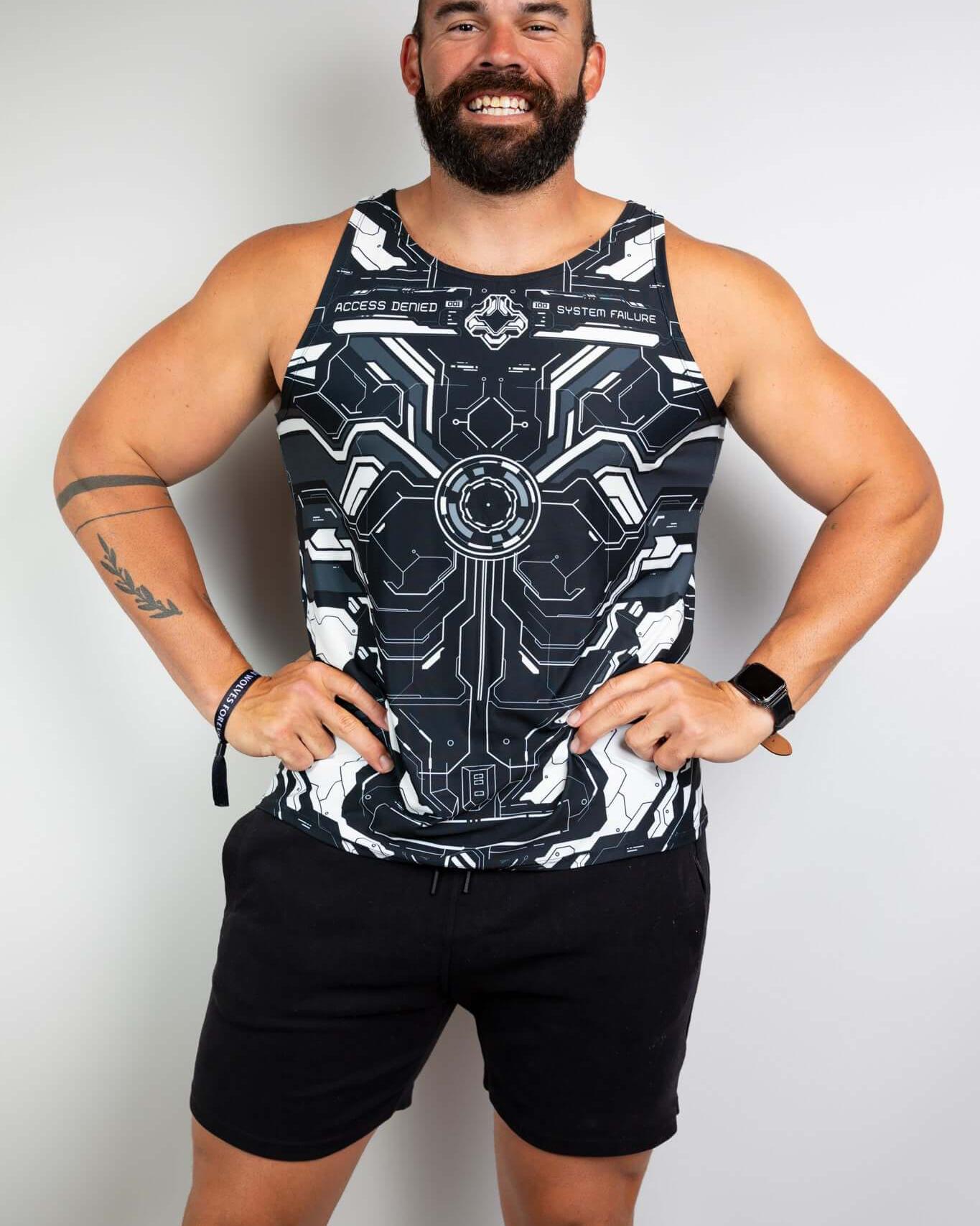 Mechanoid unisex tank top in black worn by a man, featuring a futuristic design, perfect for rave outfits and festivals.