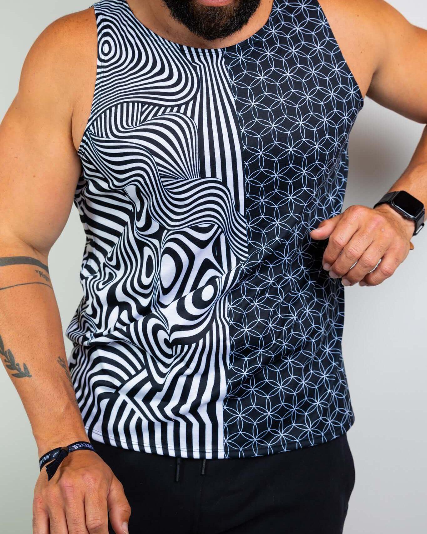 Model wearing Duality Unisex Tank Top featuring a black and white graphic design, perfect for rave outfits.