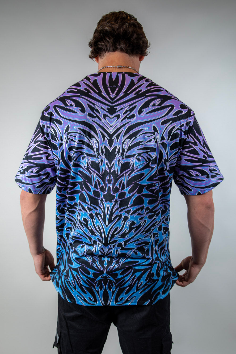 Back view of the Chromium Oversized Softee, displaying its oversized cut and detailed cyber sigalism pattern.