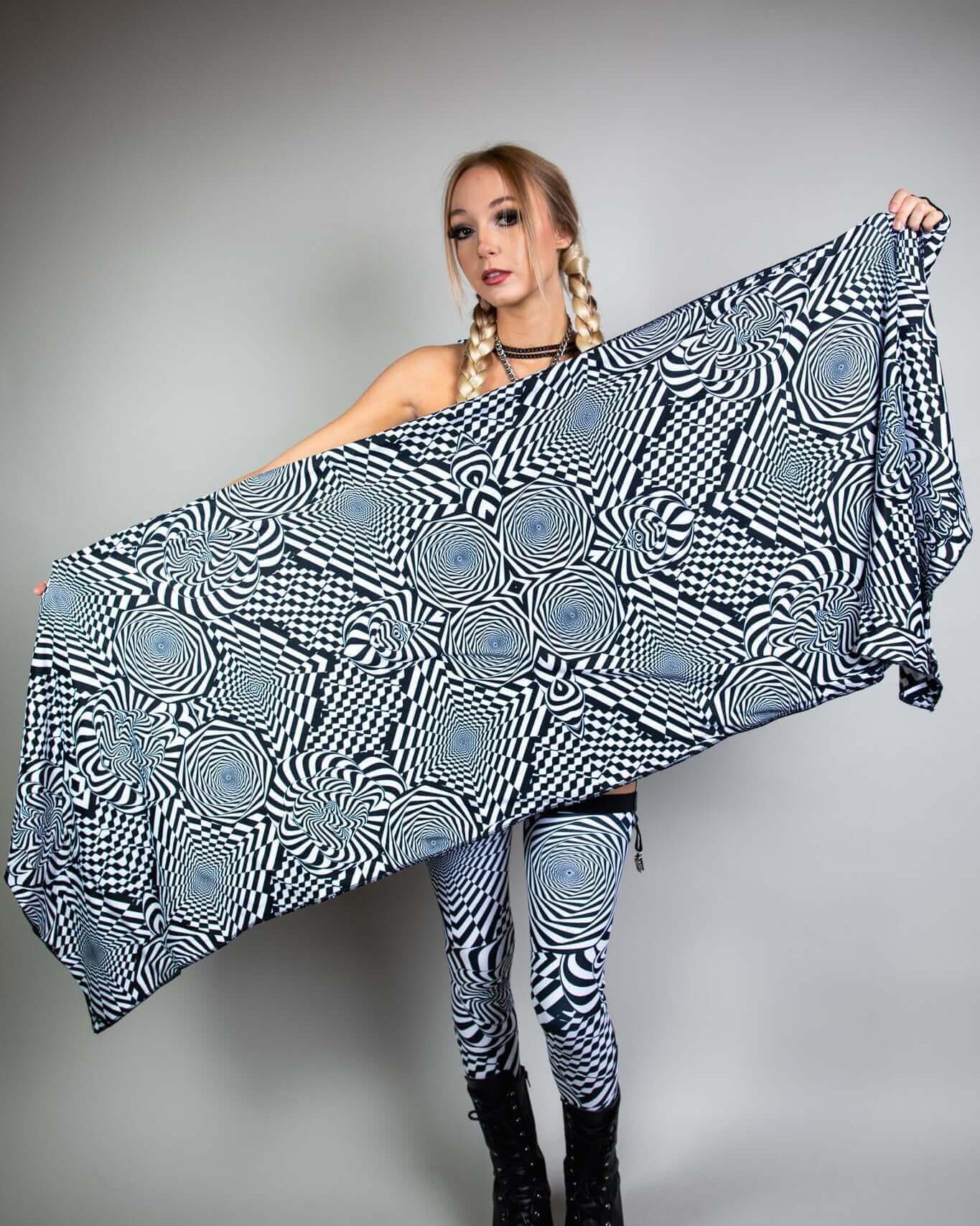 Model showcasing Distortion Festival Scarf, a versatile rave utility tool, paired with stylish printed leggings.