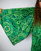 Vibrant green Dominion Festival Scarf with intricate psychedelic patterns and tiny dinosaur details.