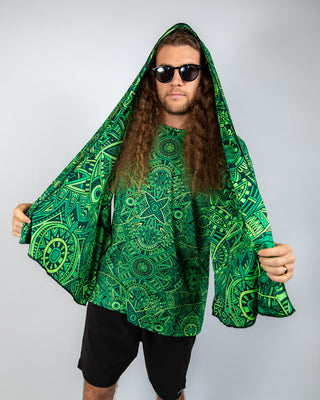 Model wearing the Dominion Festival Scarf with psychedelic green print, showcasing a bold and stylish oversized fit.