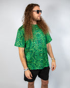 Dominion Oversized Softee rave t-shirt featuring bold green psychedelic pattern and relaxed fit style.