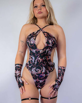 Front view of the Drakonis Halo Bodysuit featuring adjustable straps and a bold design.