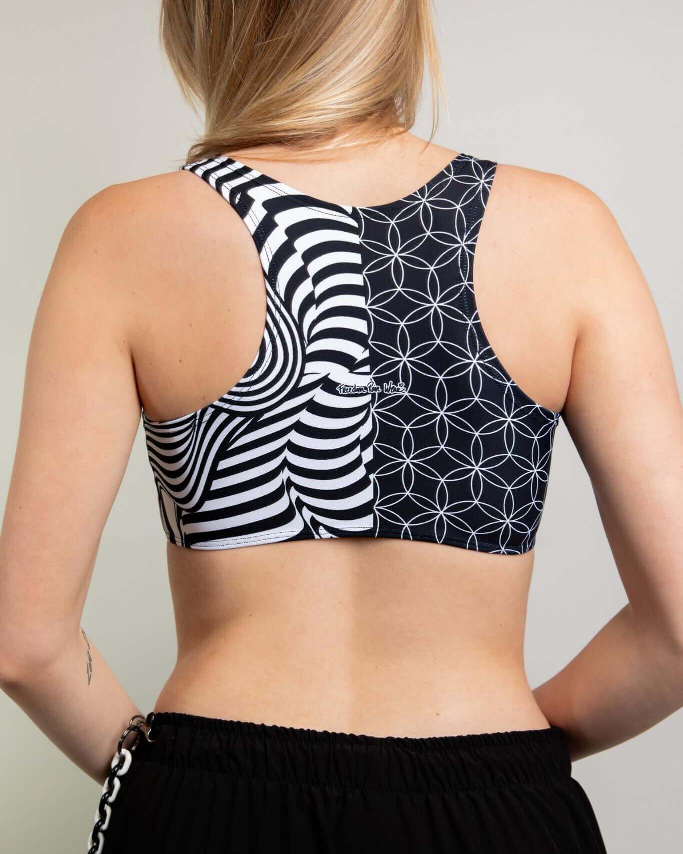 Back view of Duality Teaser Top with contrasting black and white patterns, ideal for rave outfits.