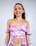 Duckies Bardot Top worn by a model showcasing the vibrant, colorful print, ideal for rave outfits.