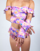 Duckies Gloves showcasing bold purple, yellow, and pink colors, perfect for rave outfits and festival energy.