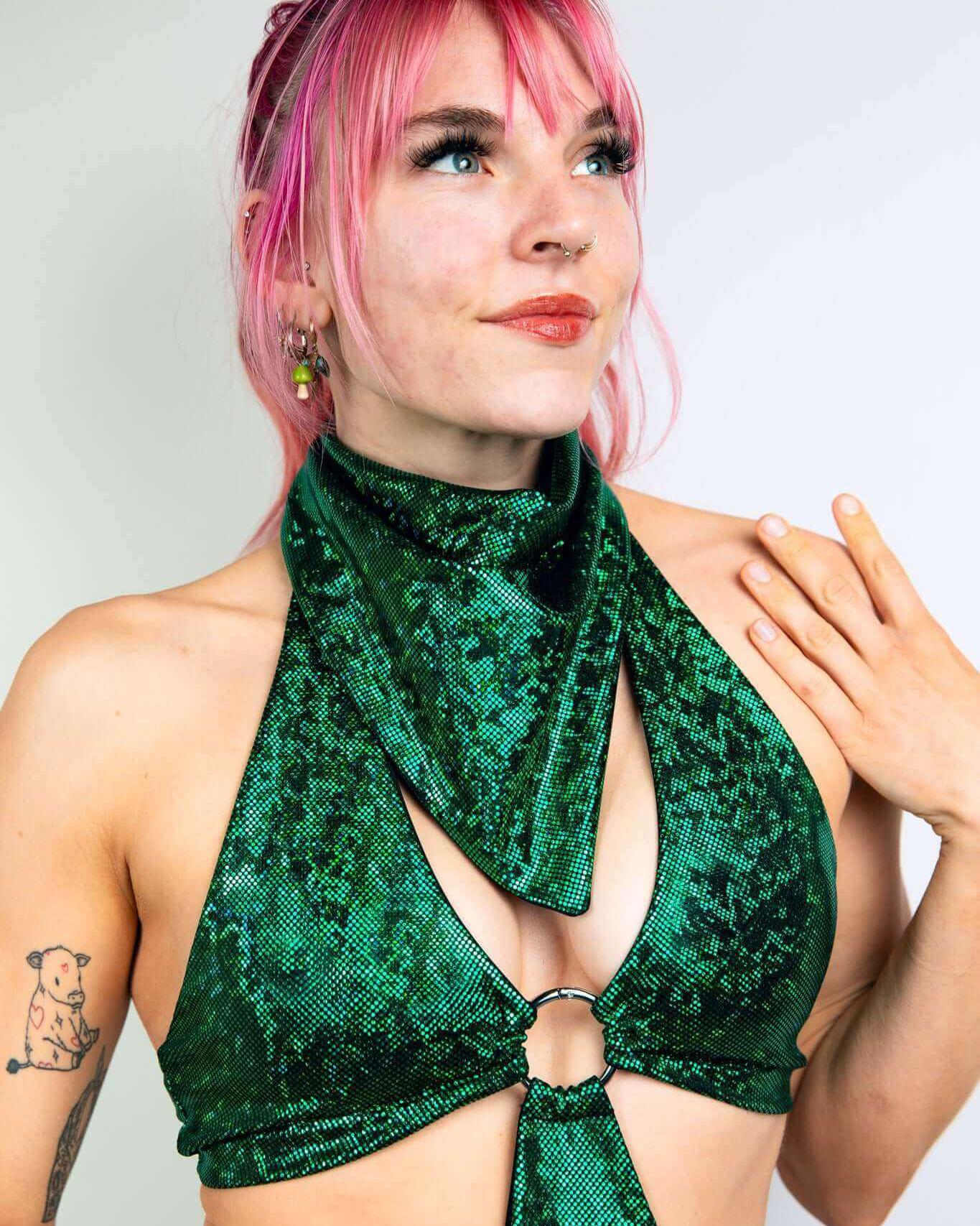 Model showcasing an emerald holo bandana styled as a neckpiece, perfect for rave outfits and versatile fashion looks.