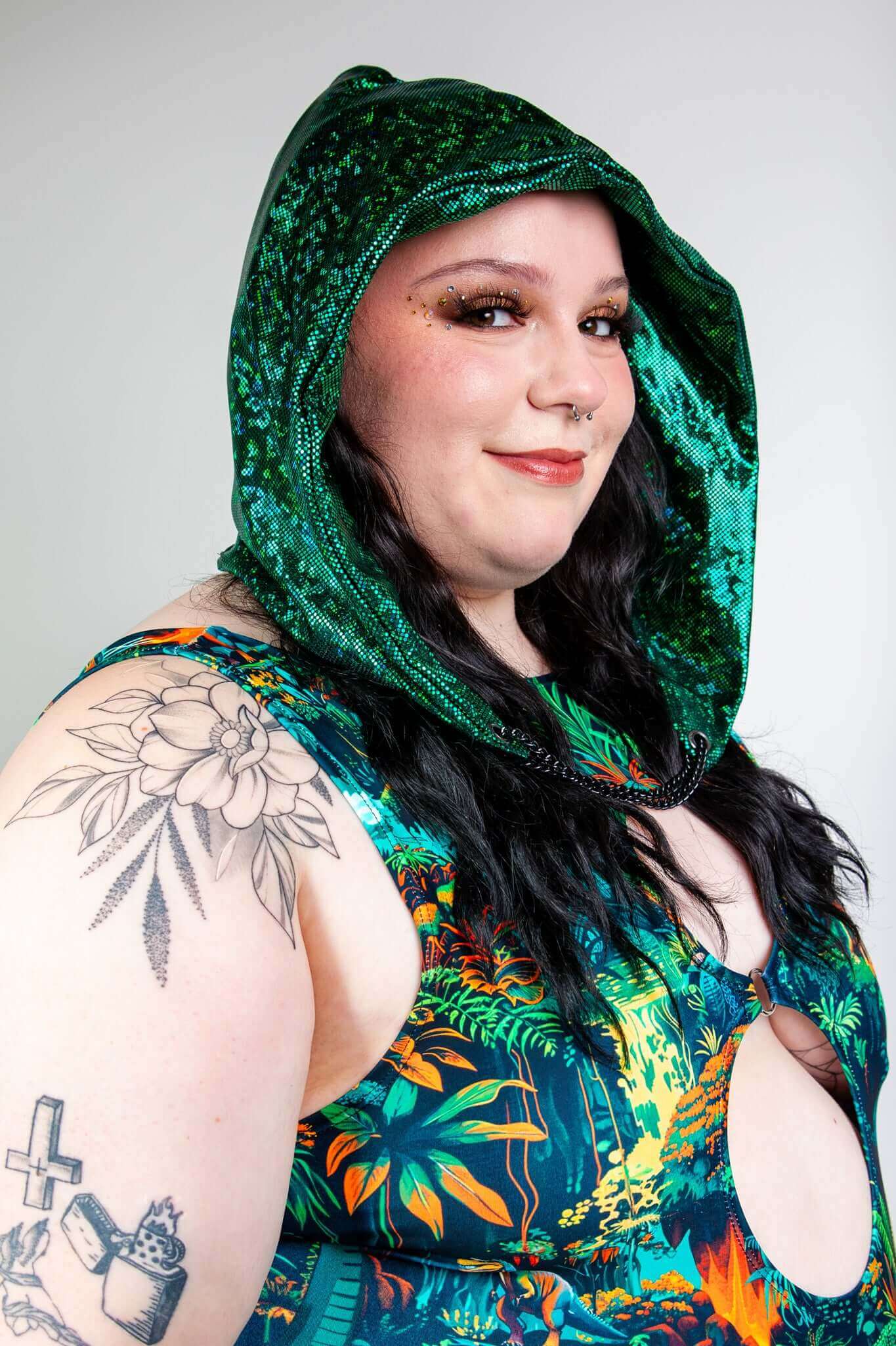 Freedom Rave Wear plus-size rave bodysuit featuring a sparkly green hood and vibrant jungle design, ideal for making a statement at raves.