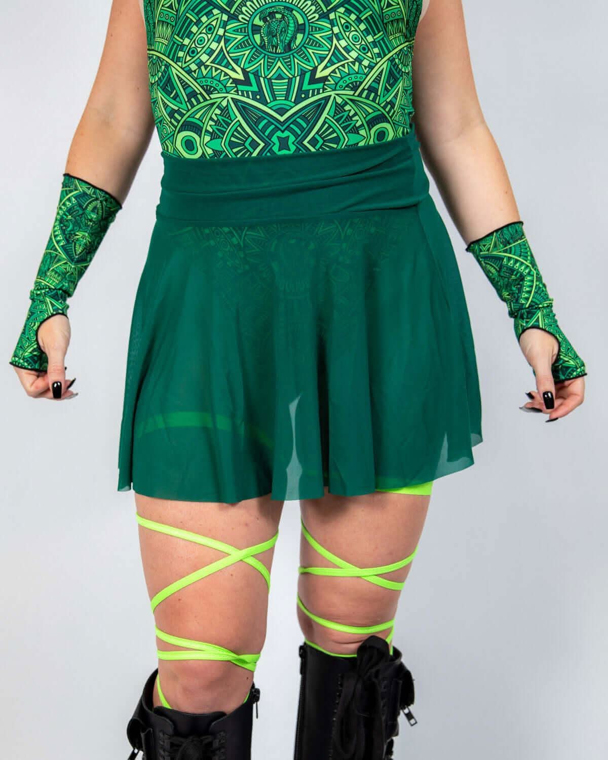 Emerald Mesh Skater Skirt paired with green accessories, perfect for rave outfits and festival vibes.