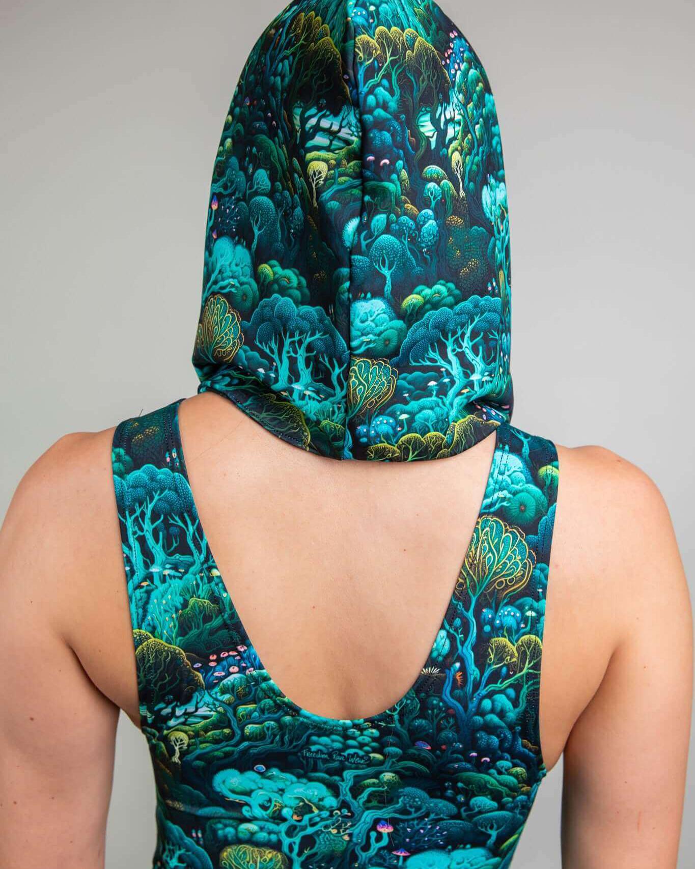 Faewood Assassin Hood showcasing vibrant forest design, perfect for rave outfits and festival wear.