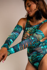 Close-up of Faewood Slit Arm Sleeves with forest-inspired print, featuring slit design, ideal for rave and festival fashion.