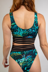 Faewood Sporty Top featuring vibrant forest design, perfect for workouts and rave outfits. Sustainable material used.