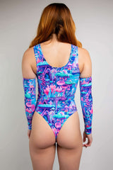 Fairycore High Neck Bodysuit in vibrant blue and pink print, featuring long sleeves and a thong back for rave outfits.