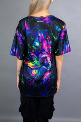 Back view of a Freedom Rave Wear oversized tee showcasing a neon fairy design, blending vibrant colors against a dark, enchanted forest scene.