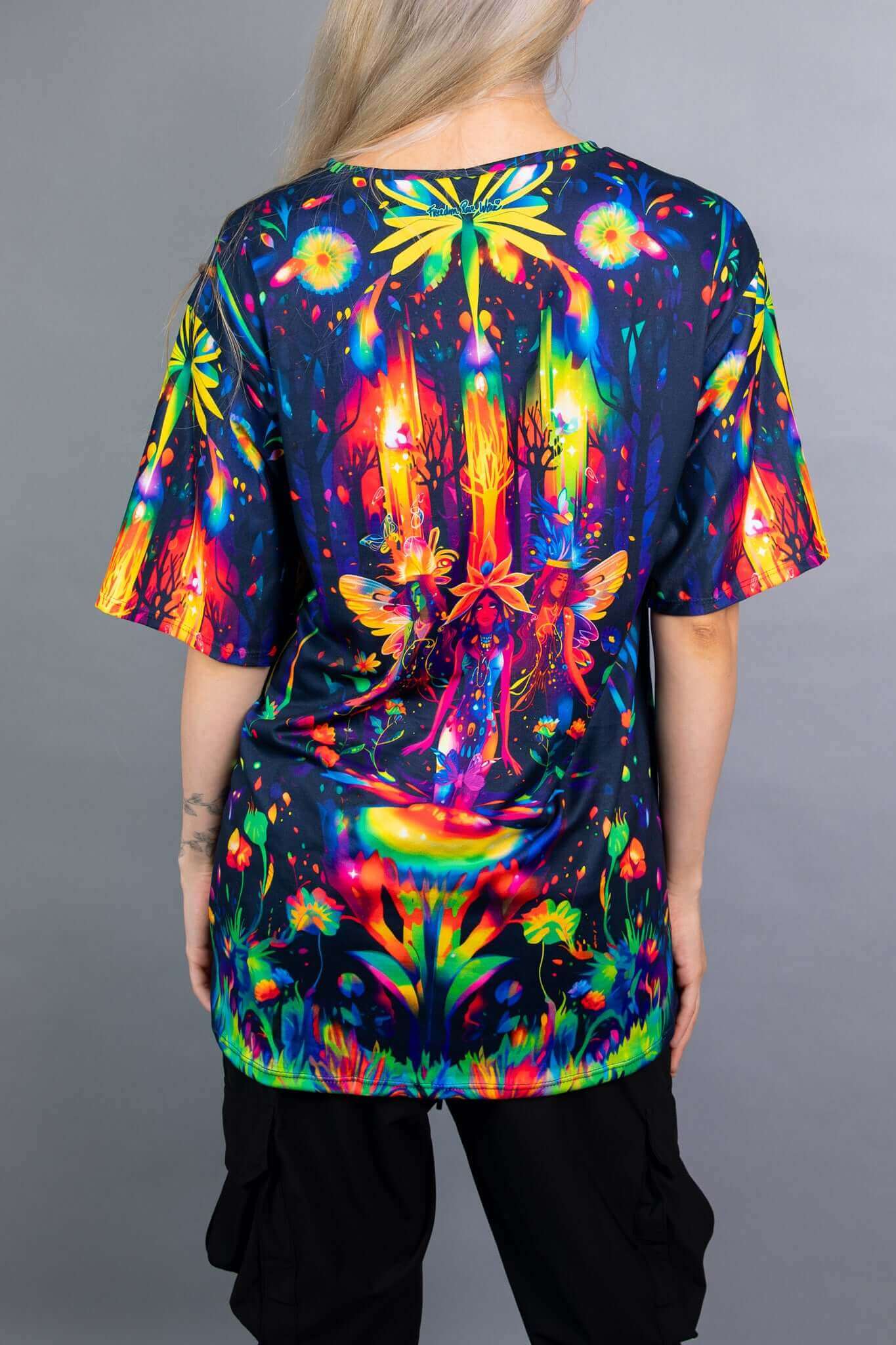 Back view of a Freedom Rave Wear oversized tee with a vibrant, fantasy forest design. Perfect for making a statement at any festival.