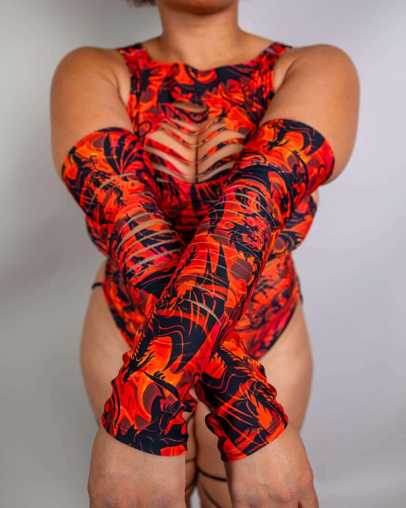 Model wearing Forbidden Slit Arm Sleeves with a fierce dragon print, showcasing stylish design for rave outfits.