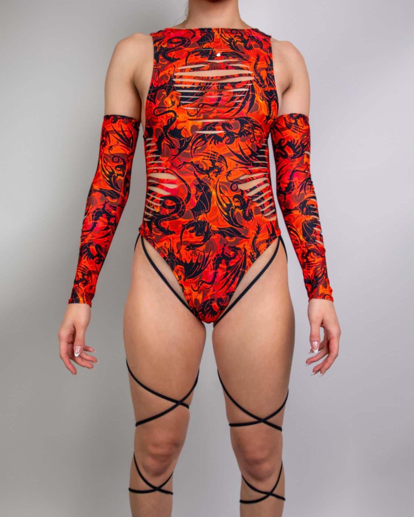 Model wearing the Forbidden Slit Sideboob Bodysuit with leg straps in fiery print, perfect for rave outfits.