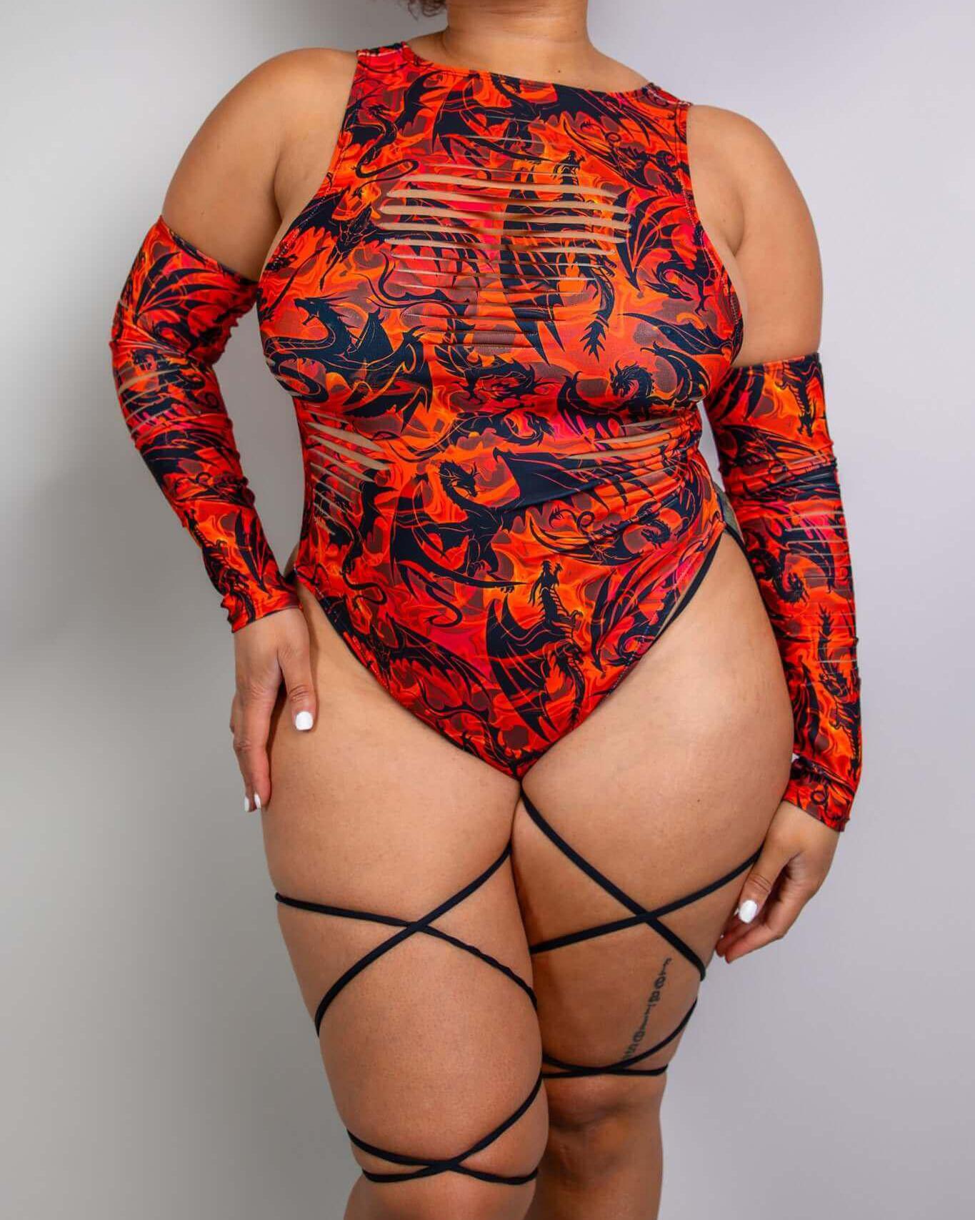 Forbidden slit sideboob bodysuit in fiery print, perfect for raves with leg straps and a bold design.