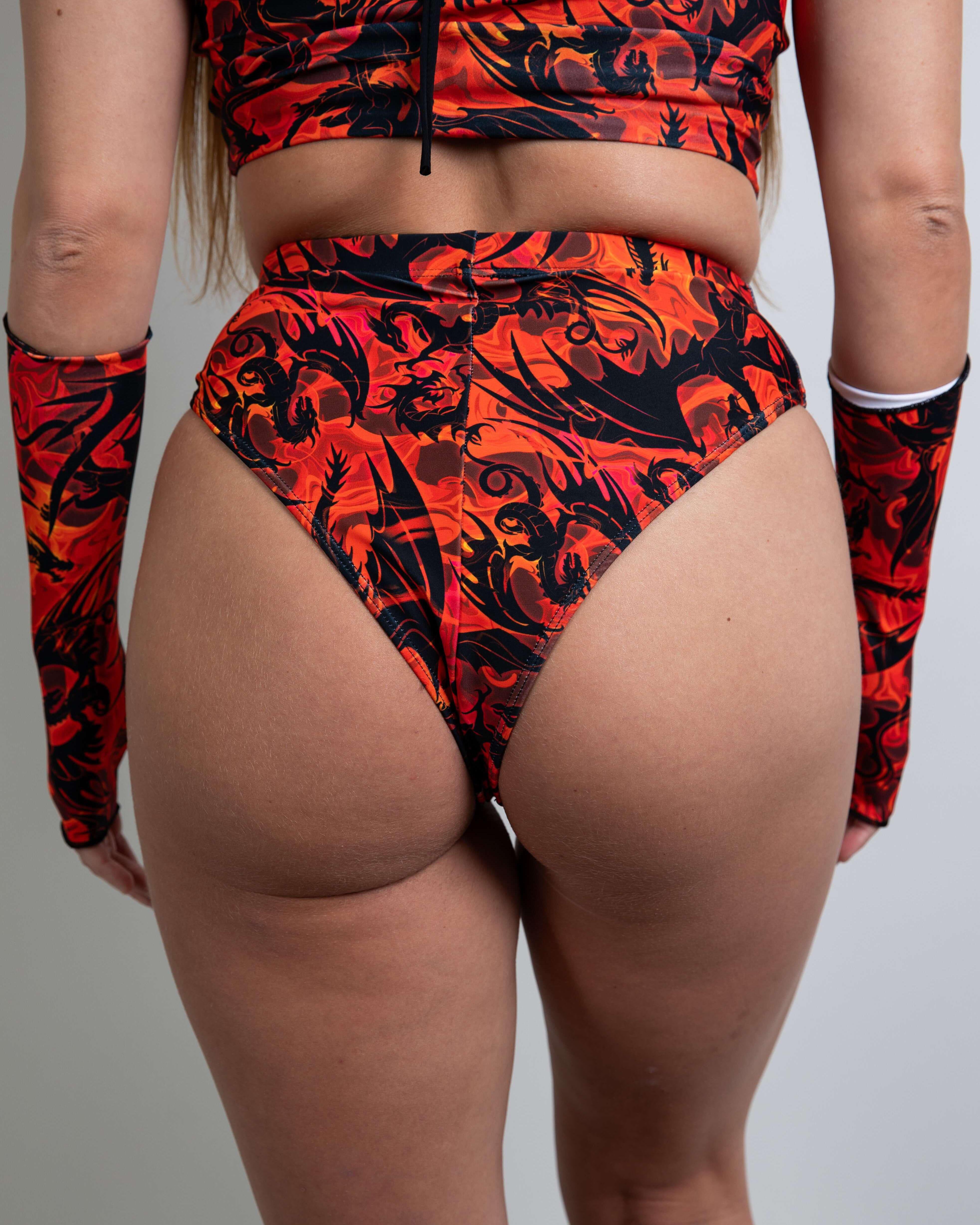 Forbidden high waisted Brazilian bottoms in bold red and black pattern, perfect for rave outfits and festival season.