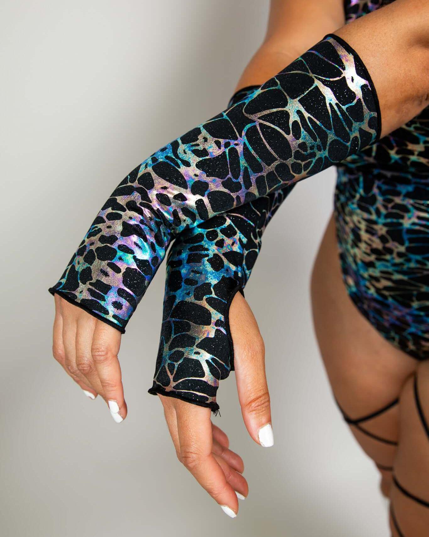 Galactica Gloves showcasing a vibrant, colorful design, perfect for rave outfits and nightlife adventures.