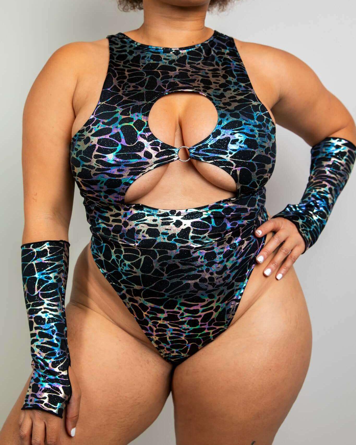 Galactica Keyhole Bodysuit featuring chest cutouts and a shiny iridescent design, perfect for rave outfits.