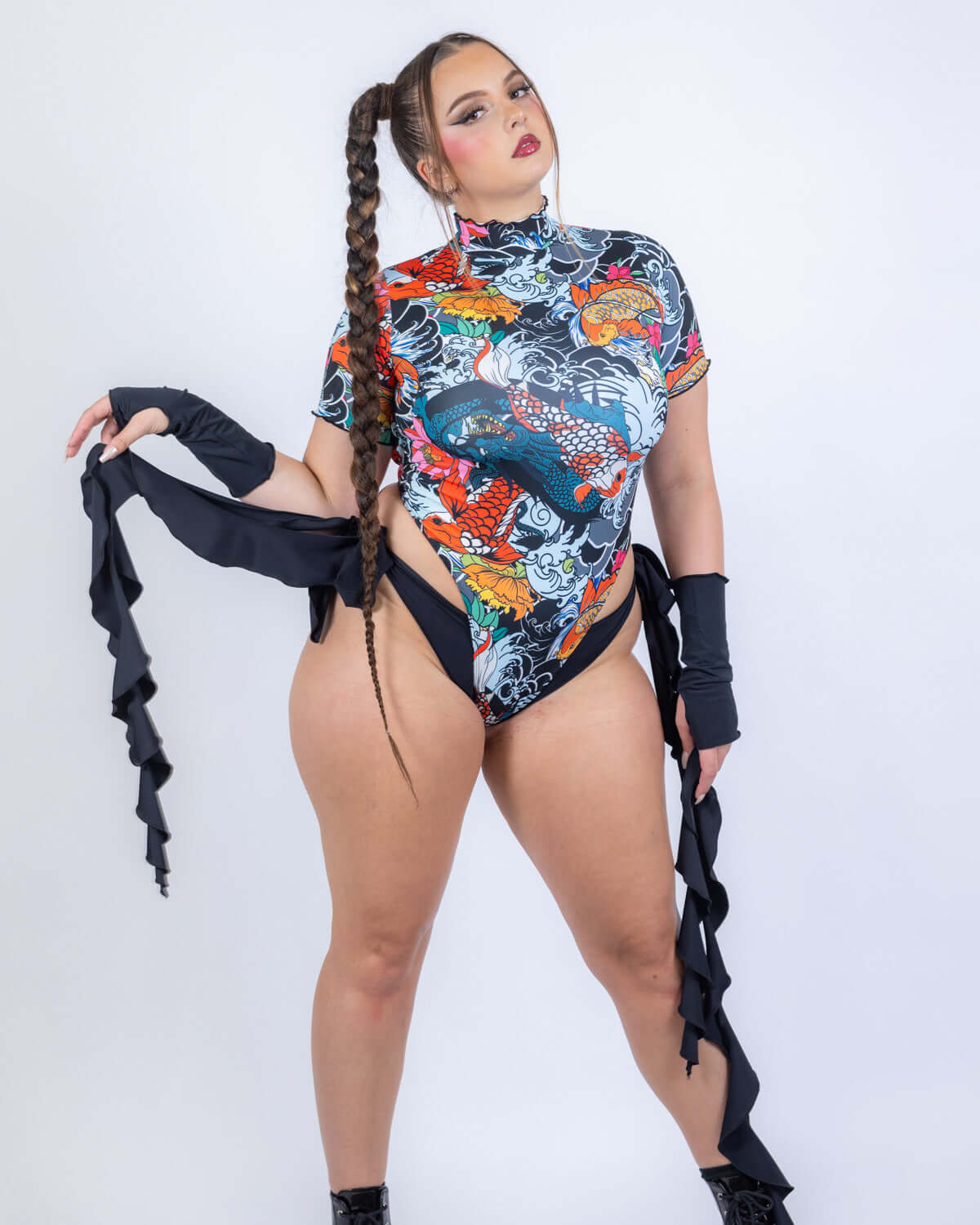 Good Fortune Wavy Baby Bodysuit Set worn by model in colorful tattoo-inspired design.