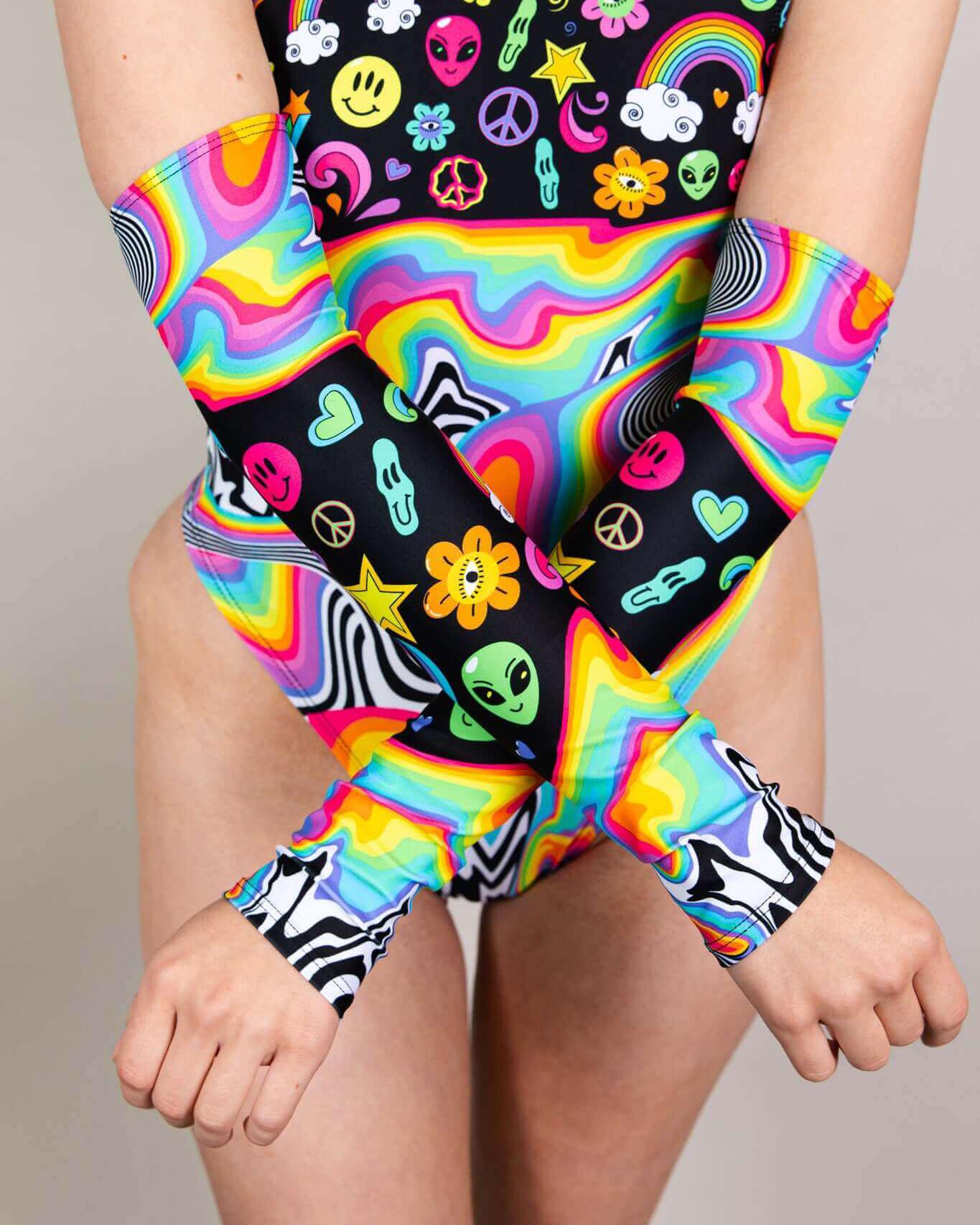 Colorful HAPPIER Arm Sleeves with rainbow design, perfect for rave outfits and adding flair to any look.