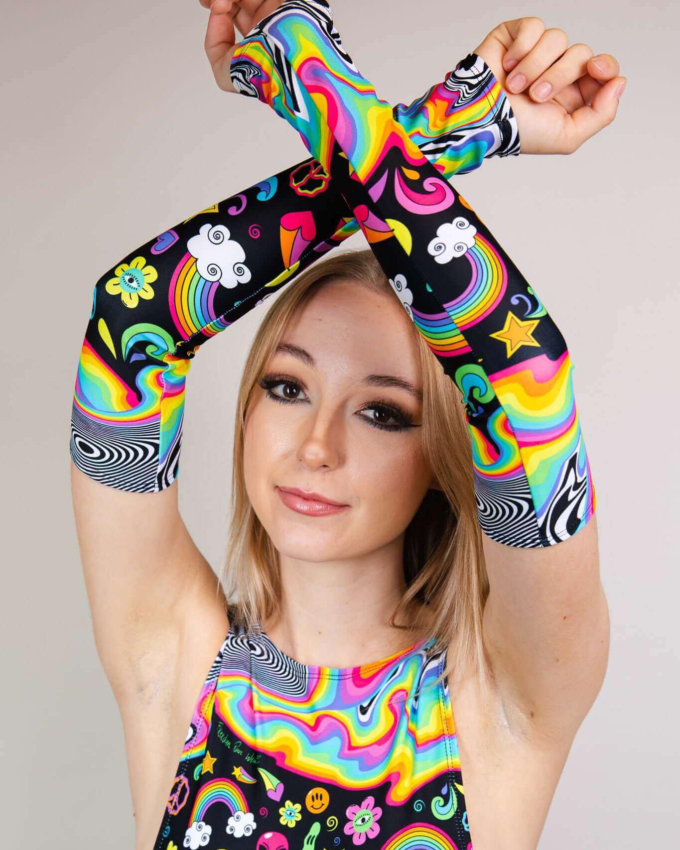 HAPPIER Arm Sleeves in trippy rainbow design, perfect for rave outfits, showcasing colorful icons and soft, stretchy fit.