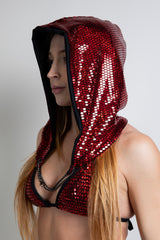 Side view of model in a red sequined Heartbreaker Assassin Hood.