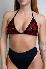 Model wearing a red sequined Heartbreaker Bikini Top.