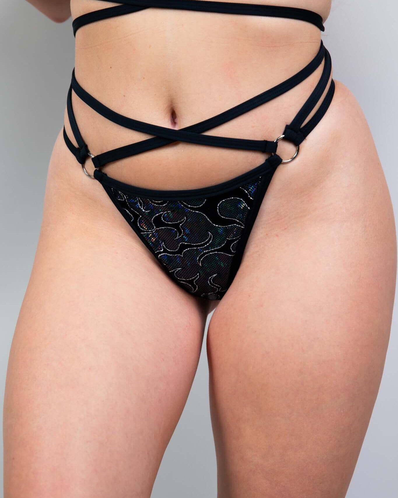 Hellcat Expose Bottoms featuring strappy design and o-ring detail, perfect for rave outfits and bold fashion statements.