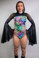 Model wearing Freedom Rave Wear psychedelic print bodysuit featuring a high neckline, sheer sleeves, and a dramatic flare at the cuffs.