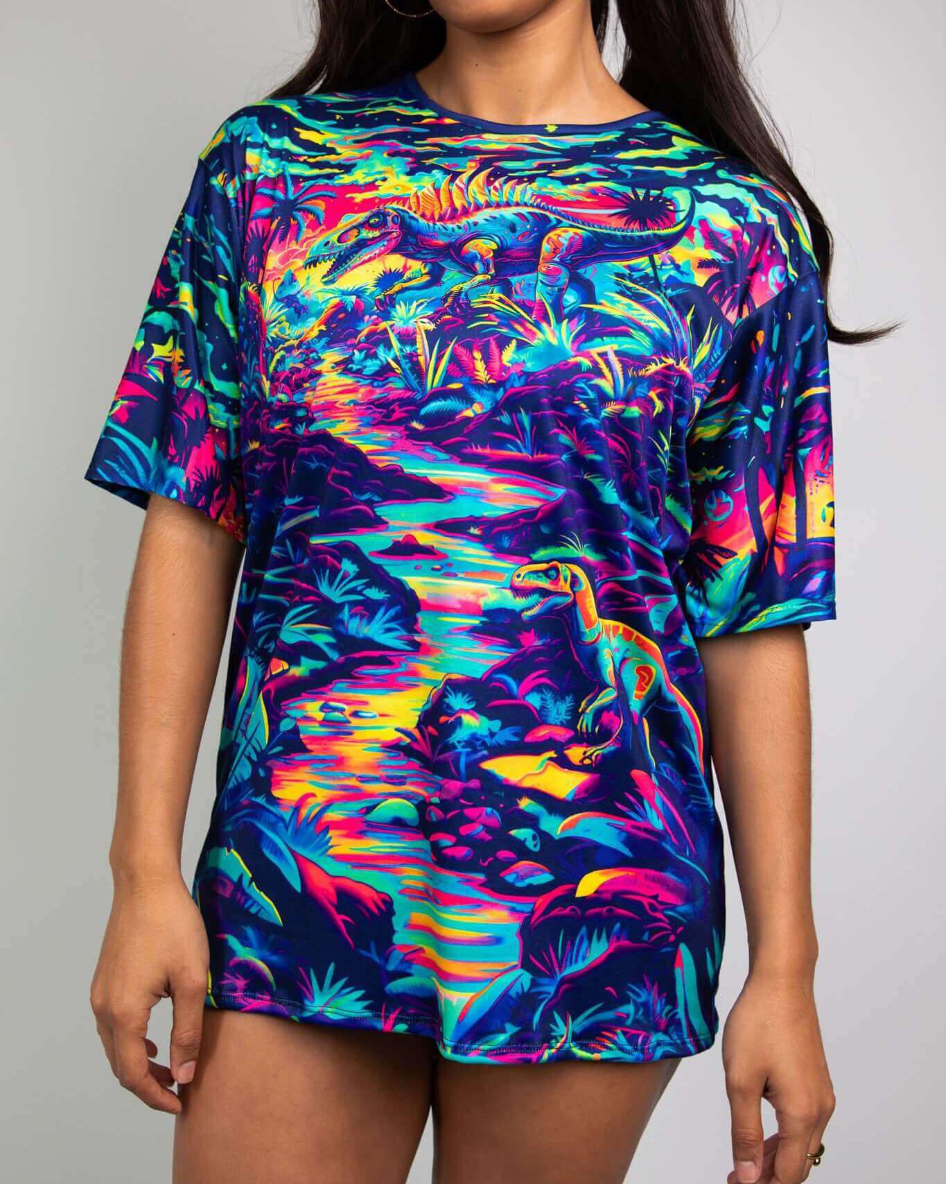 Hunter Oversized Softee rave tee featuring a vibrant dinosaur design and tropical foliage, perfect for festival outfits.