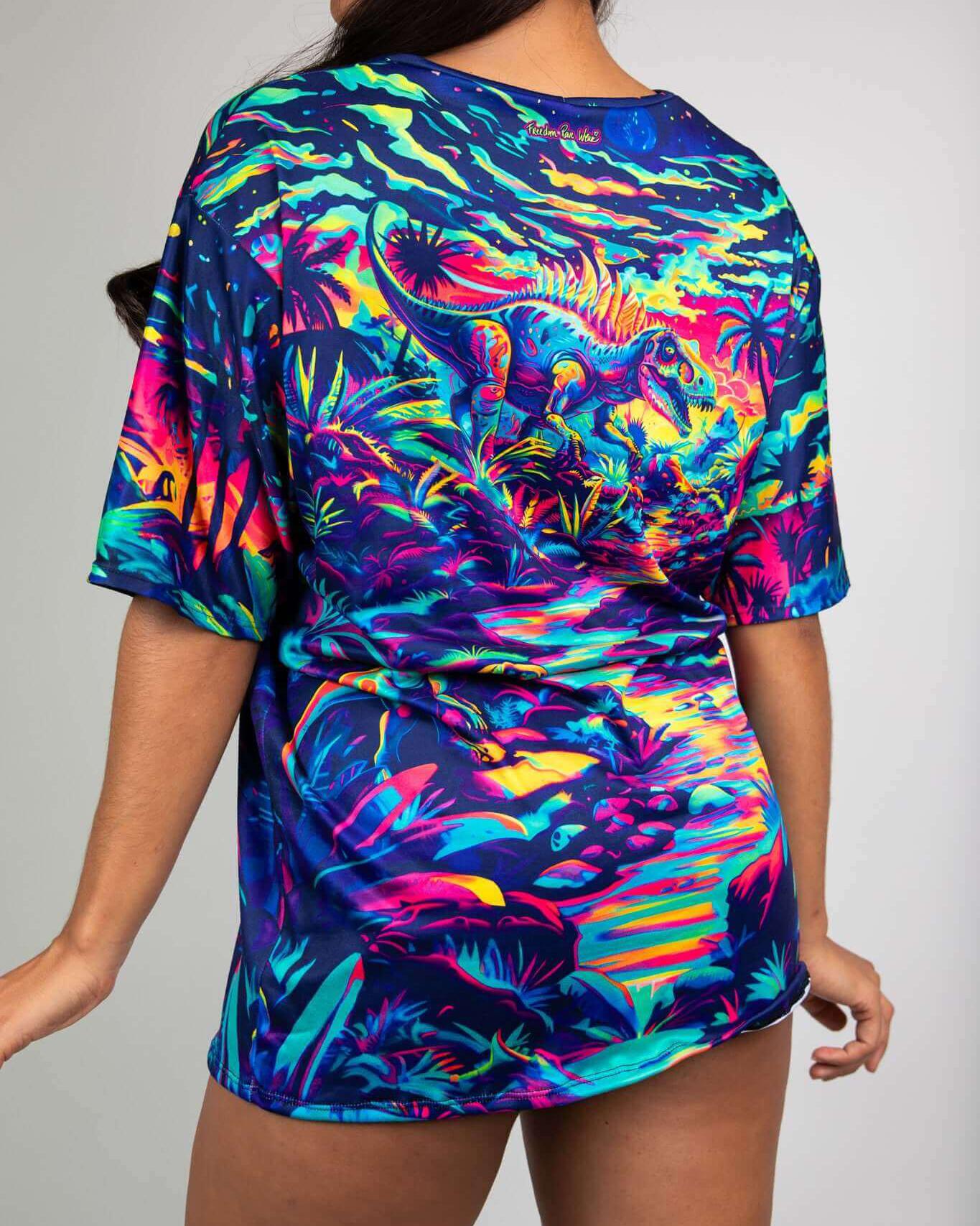 Model showcasing the colorful Hunter Oversized Softee featuring a vibrant dinosaur design, perfect for rave outfits.