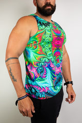 Model showcasing a vibrant, psychedelic tank top with colorful patterns, perfect for raves. Freedom Rave Wear provides unique festival fashion. 
