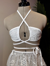 Seraphina Wrap Bikini Top in white, front view with wrap-around straps and halter neckline, displayed on mannequin.