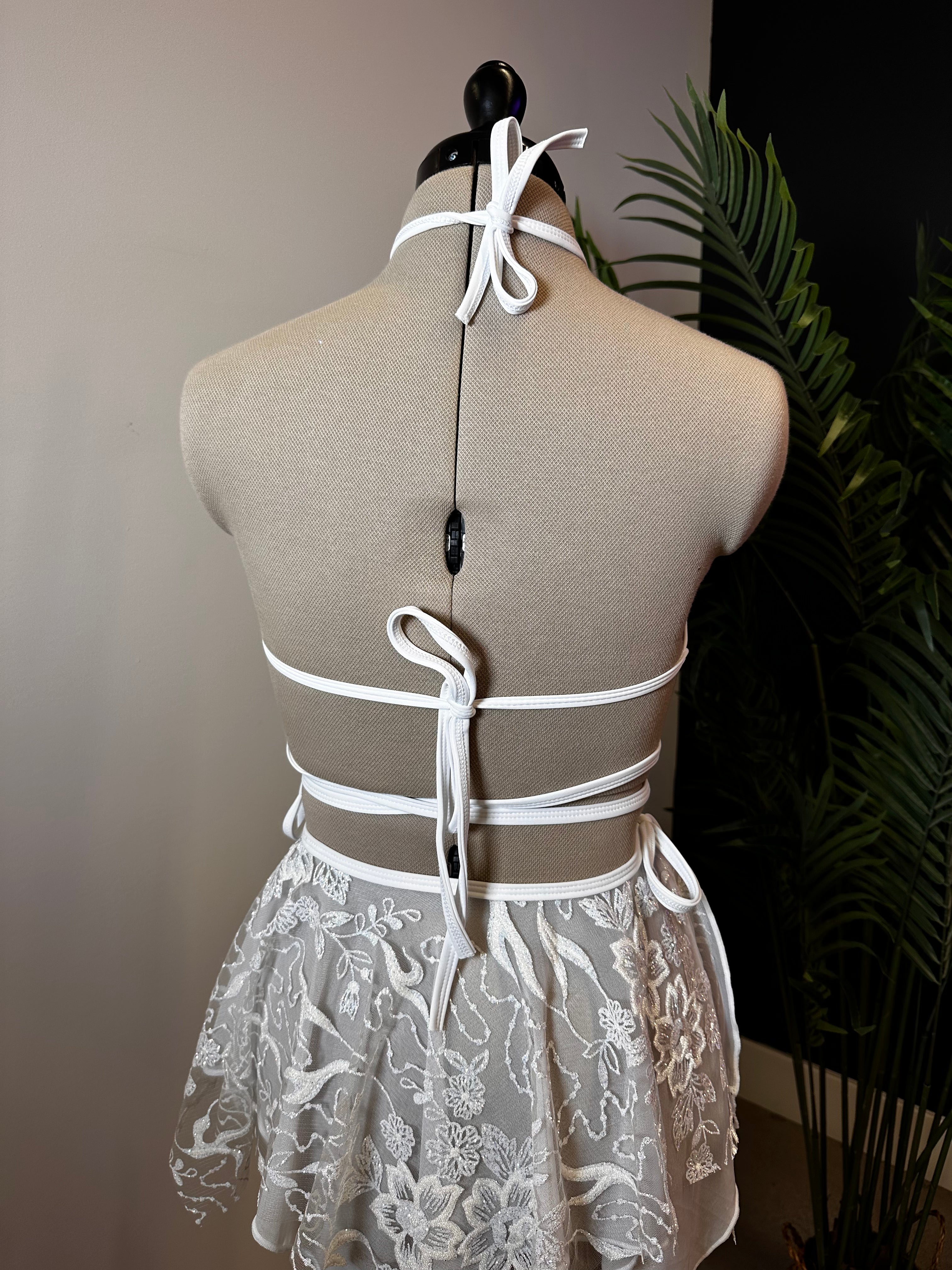 Seraphina Wrap Bikini Top in white, back view with adjustable halter strap and wrap-around detailing, for perfect fit and look.