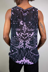 An up close photo of a man wearing a black mesh tank top with purple tattoo-like designs. He is facing away from the camera.