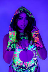 Fashionable woman in Intensity Assassin Hood showcasing trippy UV print for rave outfits.