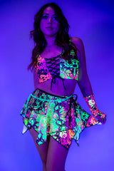 Model wearing a vibrant Intensity Fairy Skirt and matching top, perfect for rave outfits and nightlife.