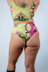 Intensity High Waisted Bikini Bottoms in vibrant trippy UV fabric, perfect for rave outfits and stylish dance comfort.